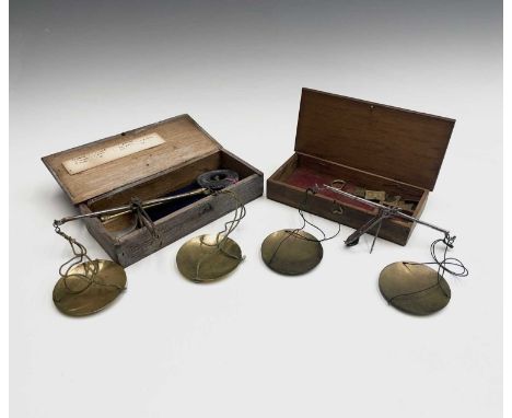 A set of brass and steel traveling jewellers scales, late 19th century, with weights, contained in an oak case, width 17.5cm,