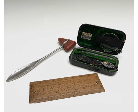 Medical Instruments - A Millikin &amp; Lawley ophthalmoscope (cased), and a tendon hammer, together with a First World War pe