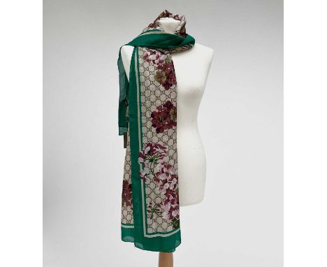 A Gucci 'Gucci Blooms' design silk scarf, with tags. 89 x 181cm.Condition report: As new condition
