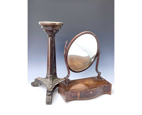 A mahogany candle stand, formed with the base of a Regency tripod table base, height 67cm and mahogany dressing table mirror,