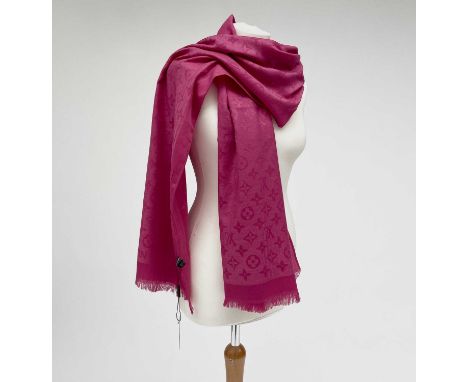 A Louis Vuitton pink monogram design cashmere and wool blend scarf, with tags. 70 x 182cm.Condition report: Very clean condit