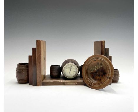 HMS Victory, An oak cased 'Rototherm' thermometer, of barrel form, flanked by two barrel form match holders, the base with at