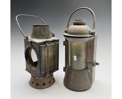 A late 19th century heavy brass railway lamp, height 34cm, together with another with gauze top (2).