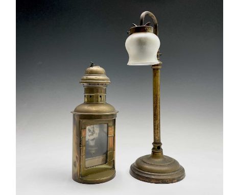 A brass circular lamp, late 19th century, with removable burner, height 29cm, together with a brass electric table lamp (2).