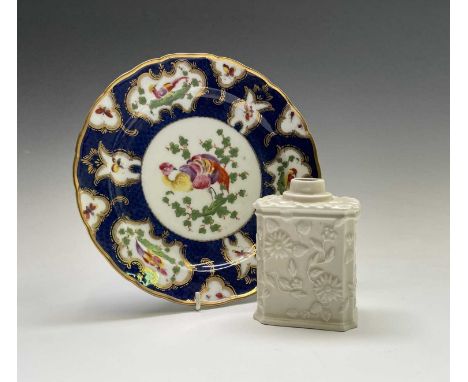 A Continental white porcelain tea caddy, 19th century, moulded with flowers and foliage, height 11cm, together with a Contine