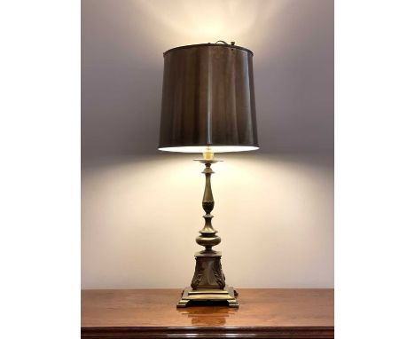 A brass table lamp, 20th century of neo-classical form, with metal shade and leaf capped square base, height 78cm.