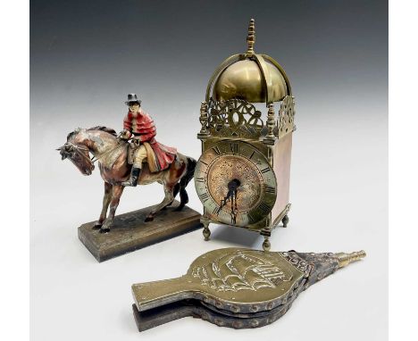 A reproduction brass lantern clock, fitted a French movement, height 32cm, together with a painted spelter table lighter mode