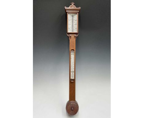 A Victorian walnut stick barometer, by J Hicks, London, with ivory scales, twin vernier indicators for yesterday and today at