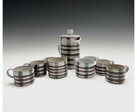 A Briglin studio pottery tea set, comprising of six cups, a milk jug, a sugar bowl and a teapot.