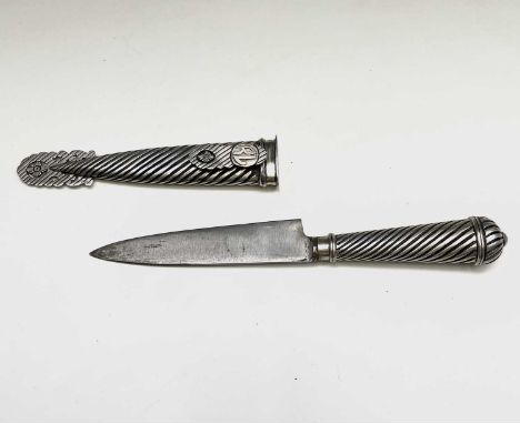 An Argentinian gaucho knife, mid 20th century, with spiral white metal grip and similarly decorated scabbard, initialled RL, 
