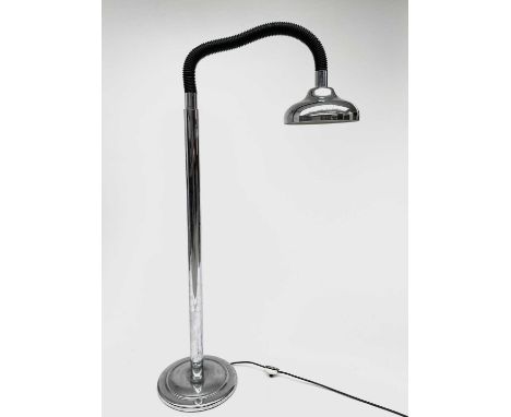 A chrome standard lamp, later 20th century, with flexible upper stem, dished shade and circular base, maximum height 206cm.