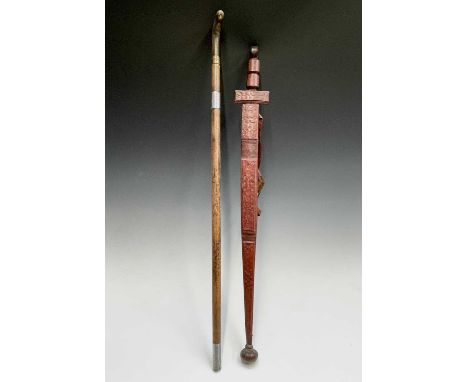 A middle Eastern swordstick, with horn handle, length 96cm, together with an African leather covered sword (2).Condition repo