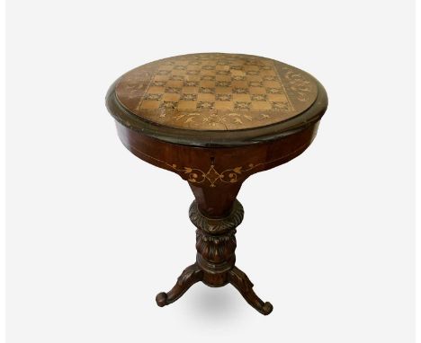 A Victorian walnut and inlaid sewing table, the circular top raised on a tapered and carved column and tripod base, height 74