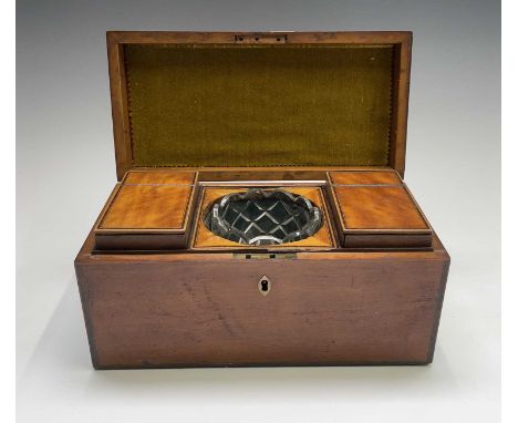 A George III satinwood and rosewood banded tea caddy, fitted with two lidded compartments and a replacement glass bowl, width