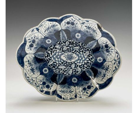 A Worcester porcelain blue and white porcelain lobed oval dessert dish, circa 1770, painted with the K'ang Hsi lotus pattern,