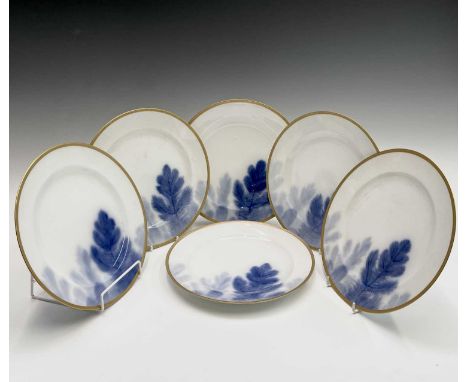 A set of six Japanese Okura porcelain plates, painted with pine branches within gilt borders, diameter 25cm.Provenance:Michae