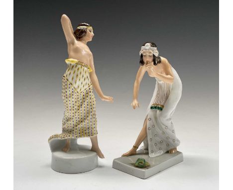 A Rosenthal porcelain figure of a snake charmer, decorated in green and gilt, designed by Berthold Boesz, model no. K442, fac
