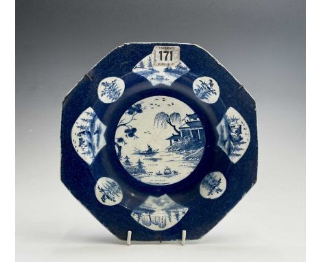 A bow porcelain octagonal soup bowl, the powder blue ground painted with a central chinoiserie landscape and further floral p