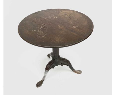 A George III mahogany tripod table, height 67cm, diameter of top 74cm.Condition report: The top is stained and split, two of 