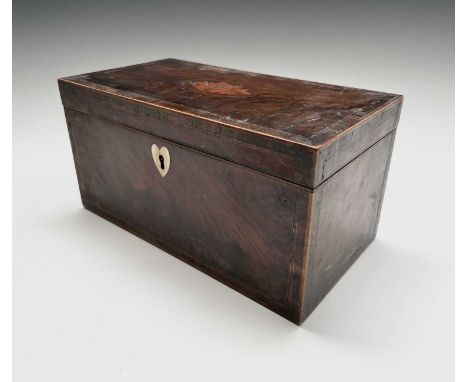 A George III mahogany, rosewood banded and inlaid tea caddy, with central shell inlay and heart shape bone escutcheon and tri