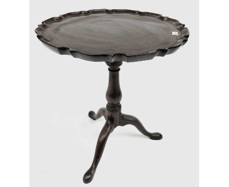 A George III mahogany tripod table, with pie crust top and bird cage action on a baluster stem and cabriole legs, height 69cm