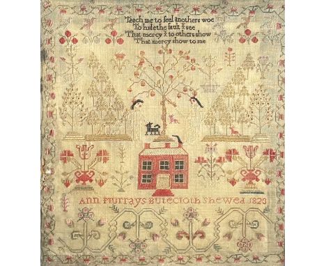 A George IV period sampler, worked by Ann Murray, dated 1823, incorporating a verse 'Teach me to feel anothers woe/To hide th