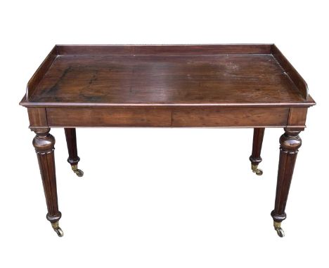 An early Victorian mahogany tray-top writing table or washstand, in the Gillows taste, fitted two flush front drawers and rai