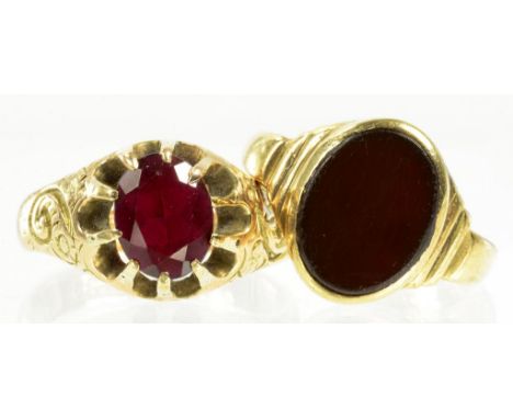 A CORNELIAN SET 9CT GOLD SIGNET RING MARKS RUBBED AND A SYNTHETIC RUBY SET 9CT GOLD RING CHESTER 1909, 8.6G