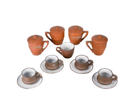 A set of four Chinese Yixing cups and saucers, 20th century. seal marks, a single Yixing cup, with carved character mark deco