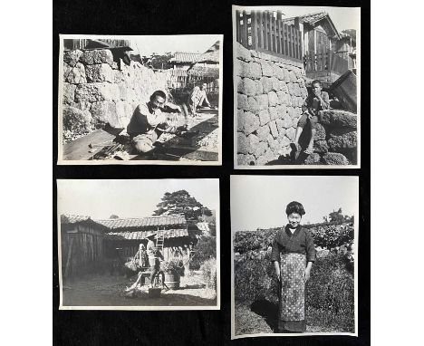 Japan interest. A collection of early 20th century photographs. A collection of well over one hundred b+w photographs depicti