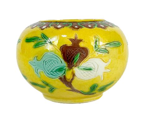 A Chinese sancai-glazed pottery jar or water pot, 19th century. With green, aubergine and white enamel decoration, height 5.5