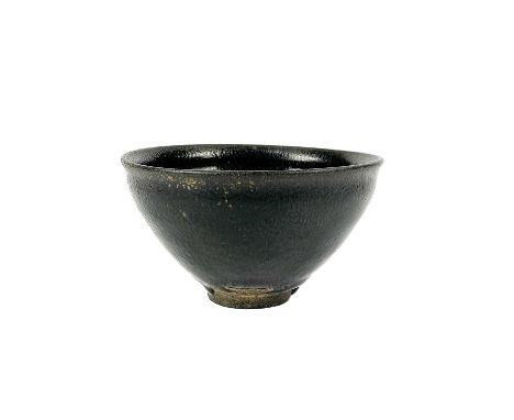 A Chinese  jian hare’s fur pottery tea bowl, Song Dynasty.  Height 7cm, diameter 12cm.Some crazing and light scratches in the