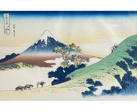 A Japanese woodblock print, 20th century. Katsushika Hokusai, 'Inume Pass in Kai Province', frame 33.5 x 45.5cm.