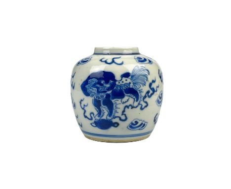 A Chinese blue and white porcelain jar, late 19th century, Four character Kangxi mark, decorated with dogs of fo and cloud sc