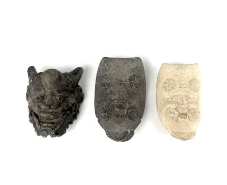 Three Japanese pottery Noh masks. 7 x 4.5cm, 6.5 x 4cm, 6 x 5cm. (3) From the estate of Frederic Lipscombe.Frederic Lipscombe