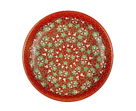 A Chinese famille rose porcelain saucer dish With painted enamel leaf decoration and gilt border, the roudels enclosing chara