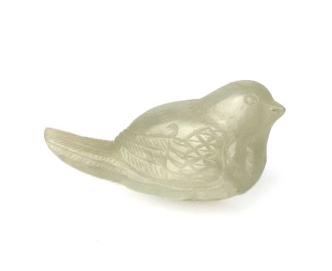 A Chinese pale jade carved bird, Qing Dynasty. Height 2.5cm, length 5.5cm, depth 1.5cm.From the estate of Frederic Lipscombe.