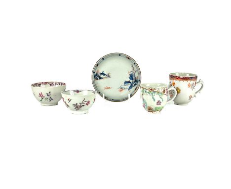 Two Chinese porcelain coffee cups, 18th century. The famille rose cup painted with figures in a landscape, height 5.8cm, diam