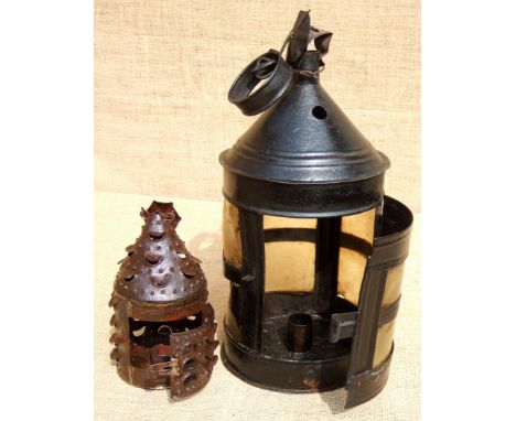 A HORN LANTERN AND A TINKER’S MINIATURE LAMP. Both 19TH century. Part of one horn ‘pane’ in the lantern is missing. The minia