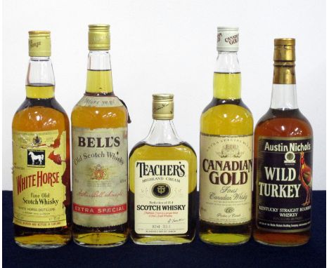 1 75 cl bt White Horse Fine Old Scotch Whisky N°2047261 sl torn label 1 75 cl bt Bells Extra Special Old Scotch Whisky 1 375 