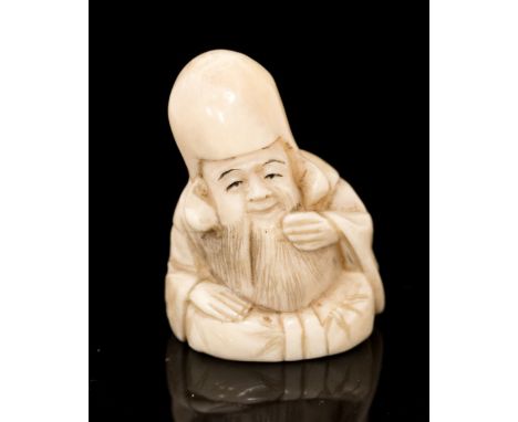 An Oriental ivory/bone netsuke, carved as Hotei scratching his beard, height 3cm