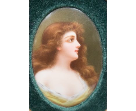 A late 19th Century oval Berlin porcelain portrait plaque, titled Reflexion, appears unsigned, titled on old paper label vers