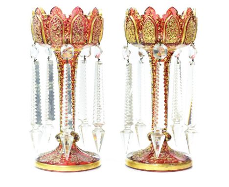 A pair of 19th Century Bohemian ruby glass lustres, circa 1860, ogee Gothic rims, tapered stems, circular feet, raised and so