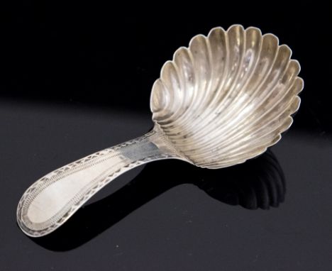 A George III silver caddy spoon, shell bowl and bright cut handle, maker Peter & Ann Bateman, hallmark London 1791 (1)
Dimens