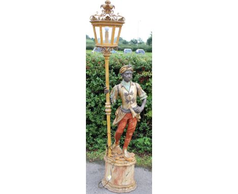A large Blackamoor figural standard lamp
