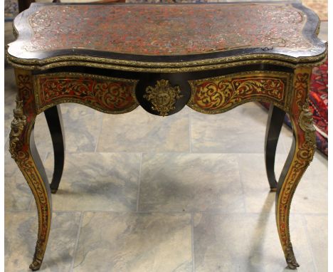 *A 19th Century French Boulle work inlaid tortoiseshell card table, brass inlay,75cm high, 90cm wide, 47cm deep