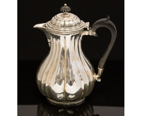 A Victorian/Edwardian William Hutton silver coffee pot, of fluted bombe form, London, (date letter rubbed), approximate weigh