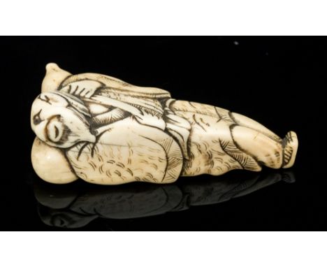 An Oriental ivory netsuke, carved as a standing bearded elder with a backpack,height 7cm, with old label 'Ex Collectis, T.L. 