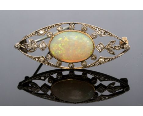 An Edwardian opal and diamond set elliptical shaped brooch, the oval cabochon cut opal approx 16mm x 12mm, small eight cut an