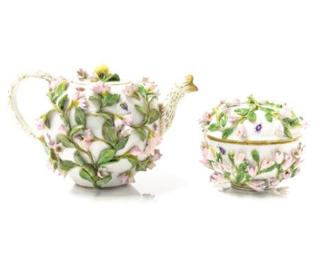 A 19th Century Meissen teapot and and covered sucrier, florally encrusted throughout and polychrome painted insects, soft gil